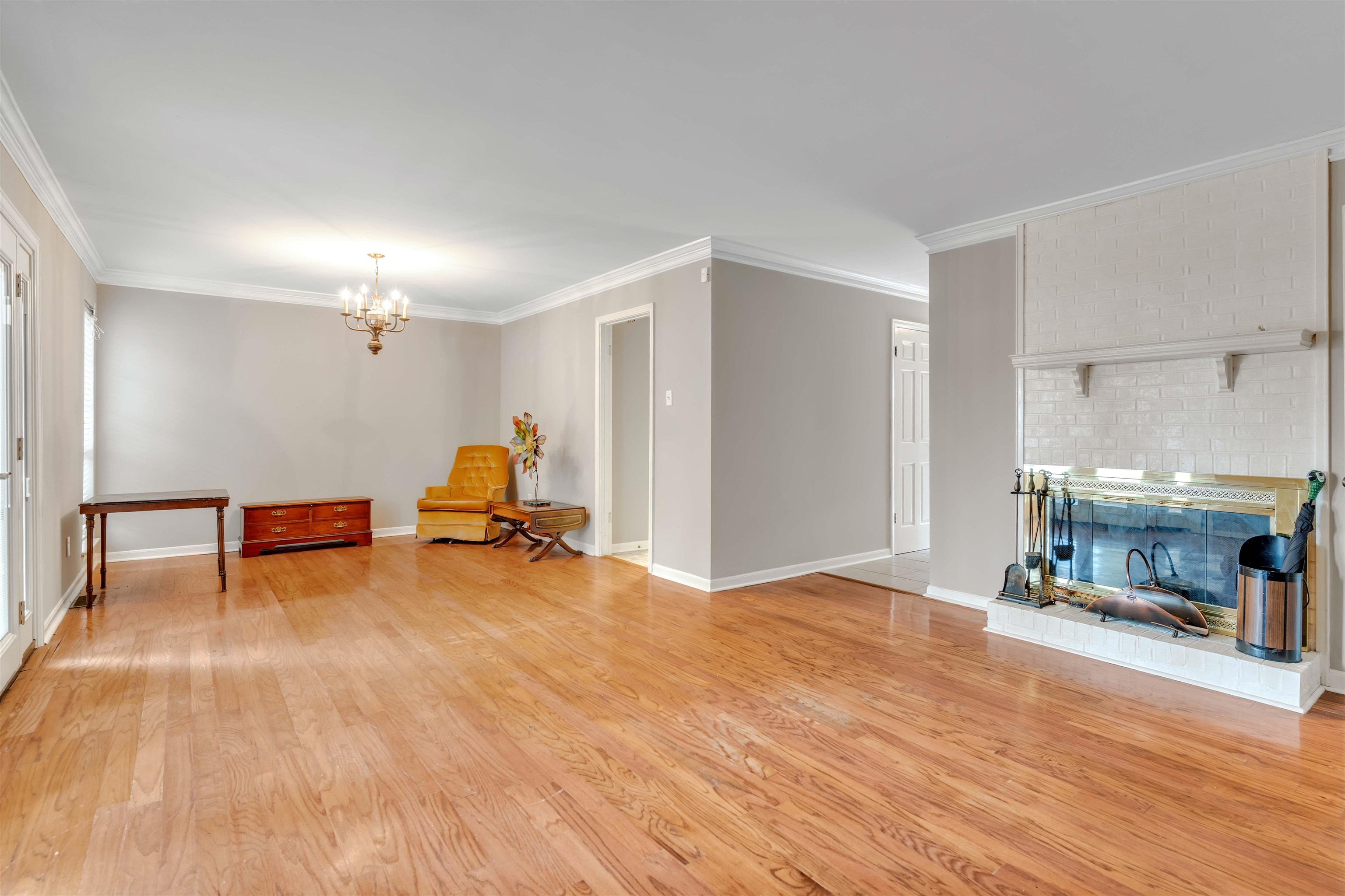 6942 Amberly Road, Unit 6942 Memphis, TN 38119 - Photo 15 of 32 a view of a room with wooden floor and furniture