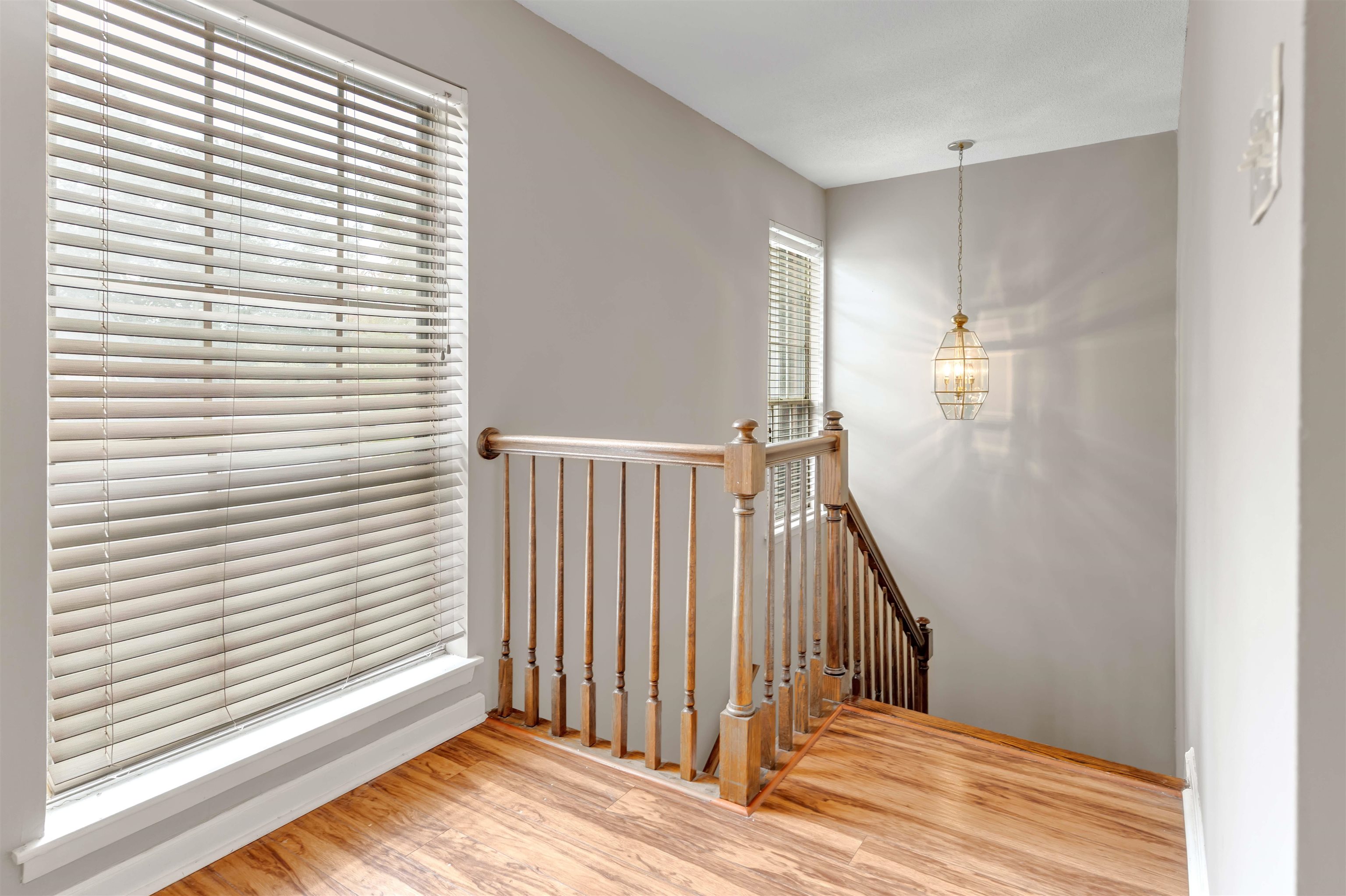 6942 Amberly Road, Unit 6942 Memphis, TN 38119 - Photo 18 of 32 a view of a livingroom with wooden floor and a window