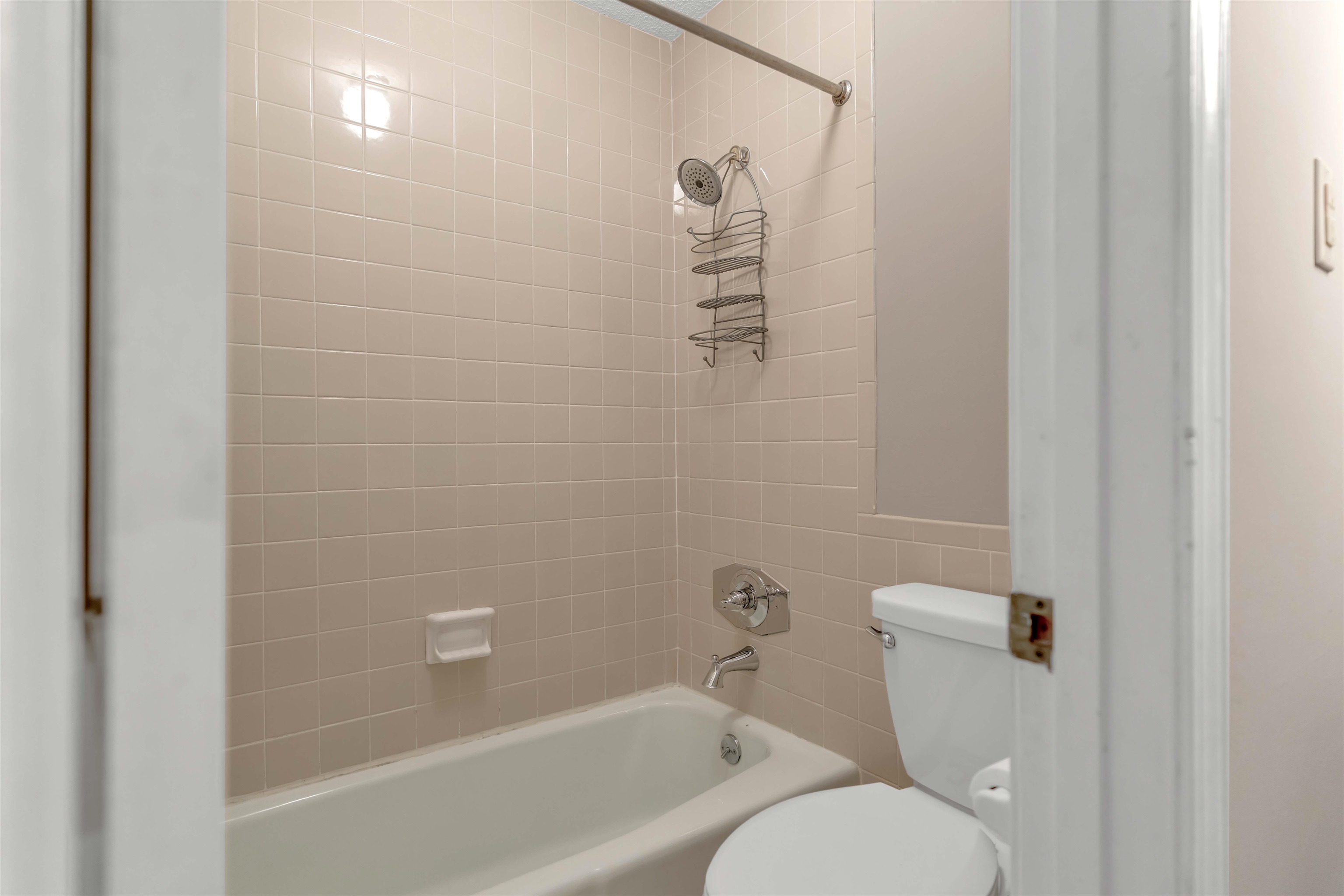 6942 Amberly Road, Unit 6942 Memphis, TN 38119 - Photo 27 of 32 a bathroom with a toilet and a shower