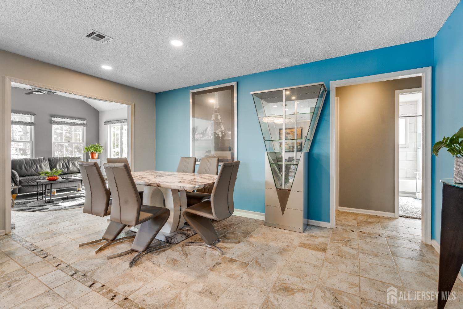845 B Taylor Road Monroe Township, NJ 08831 - Photo 5 of 15 a view of a dining room with furniture