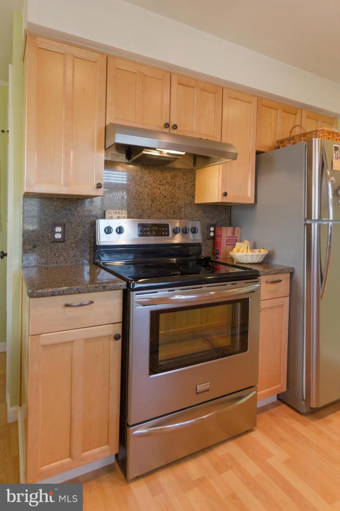 940 Olmstead Road Baltimore, MD 21208 - Photo 13 of 30 Remodeled kitchen w/stainless steel appliances