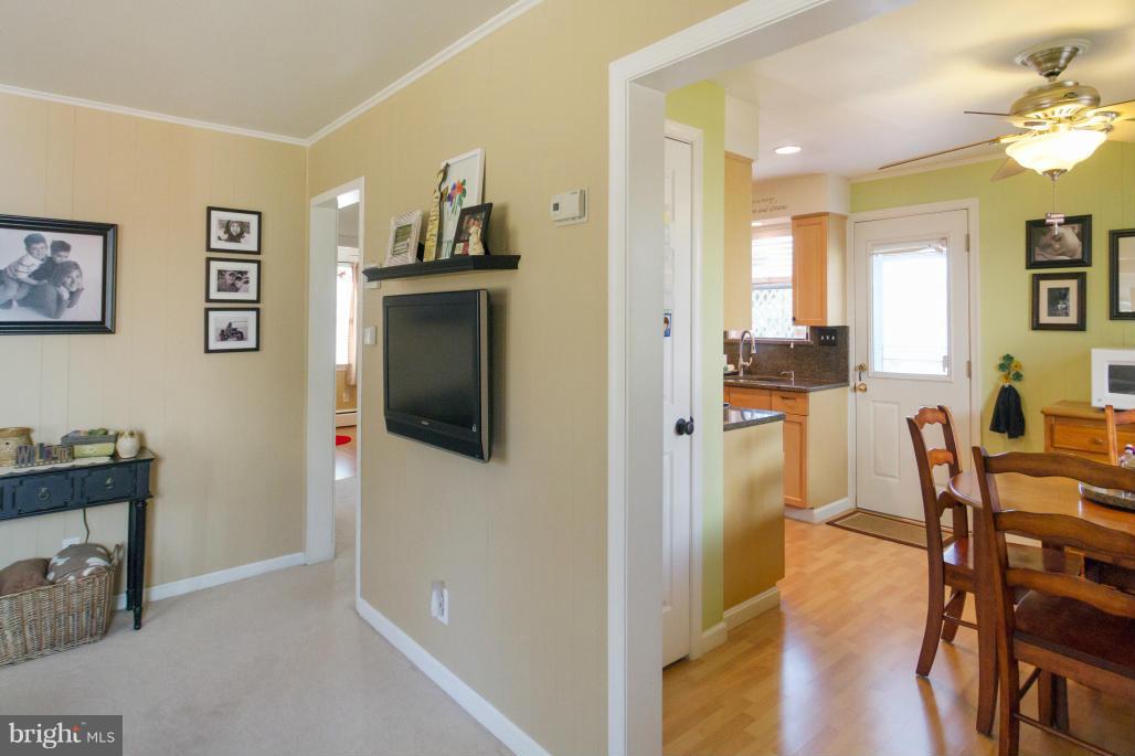 940 Olmstead Road Baltimore, MD 21208 - Photo 17 of 30 Living room opens to breakfast room