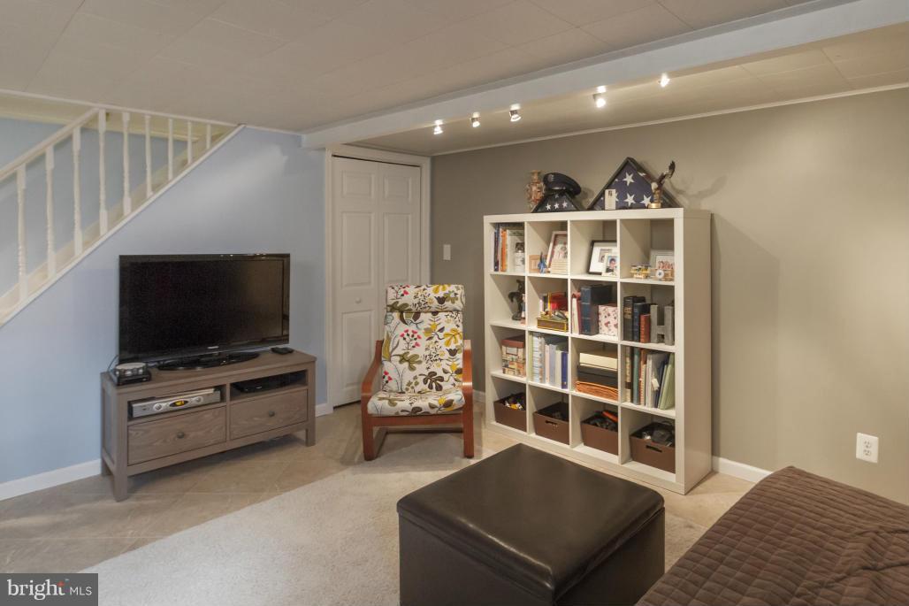 940 Olmstead Road Baltimore, MD 21208 - Photo 20 of 30 Freshly painted fam room w/ceramic tile flooring