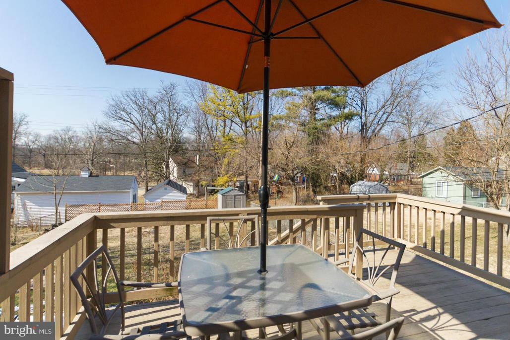940 Olmstead Road Baltimore, MD 21208 - Photo 9 of 30 Deck overlooking fully fenced rear yard