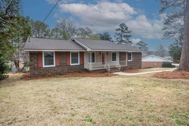 front view of house with a yard