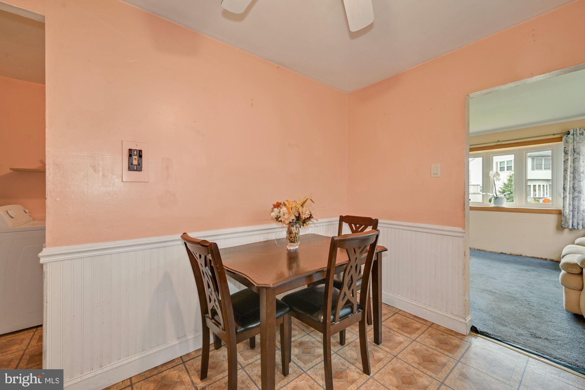439 Dewey Road Bellmawr, NJ 08031 - Photo 10 of 21 a view of a dining room with furniture and window