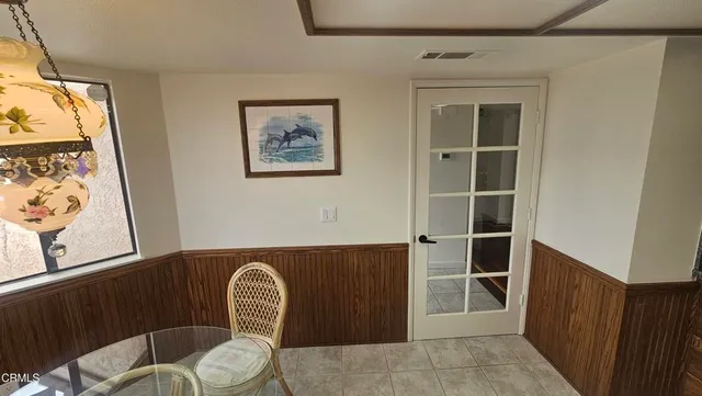 a front view of a house with white furniture