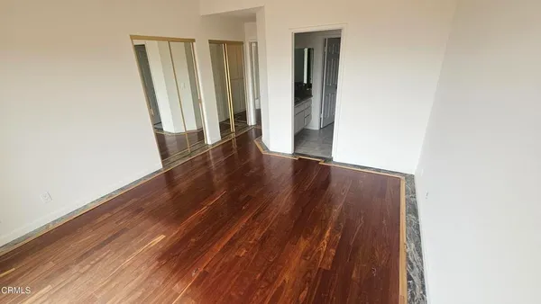 a view of a window in an empty room