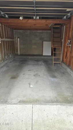 a room with pool table and a floor to ceiling window