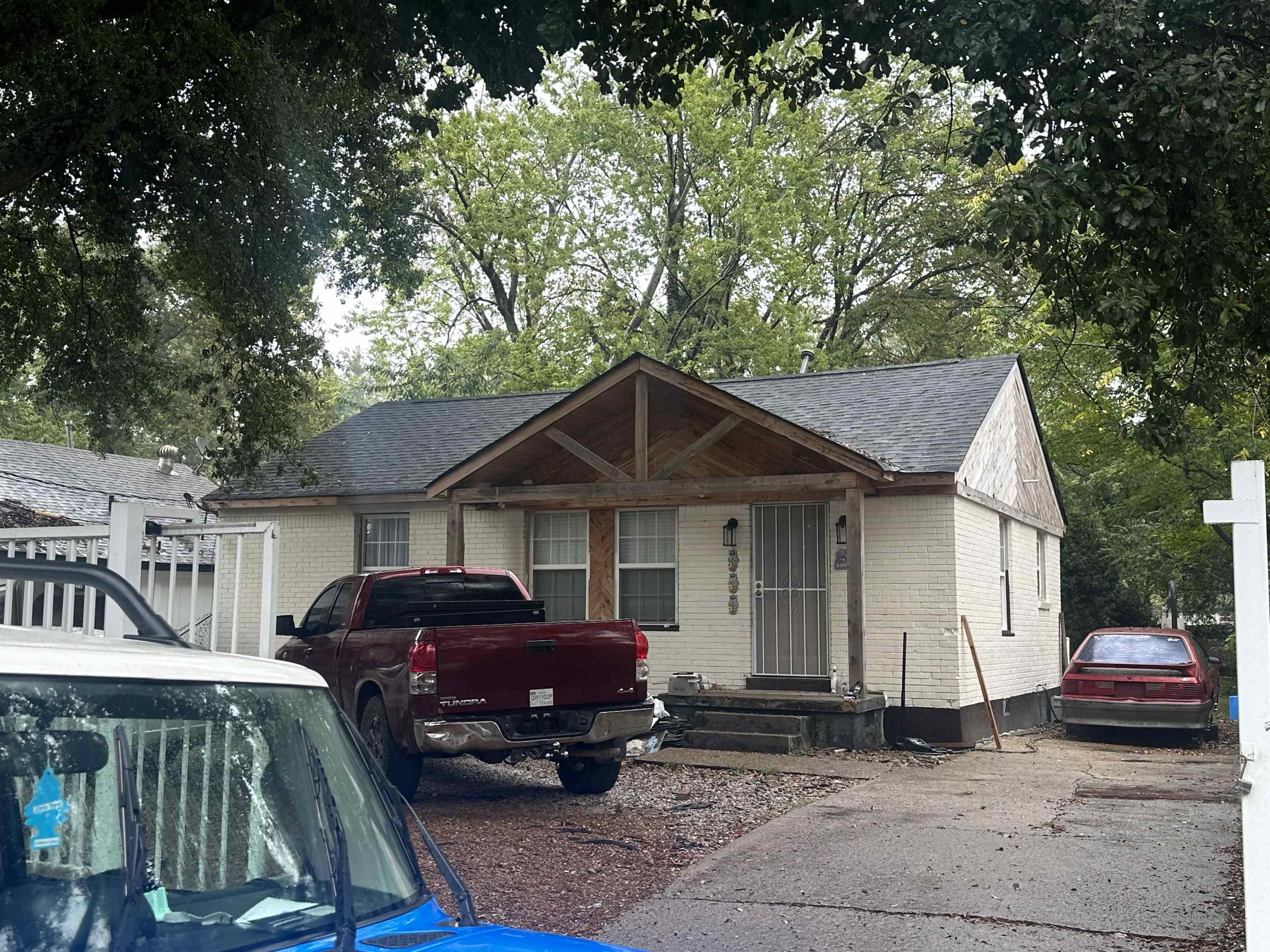 1676 Villa Road Memphis, TN 38108 - Photo 1 of 23 a view of a car in front of house