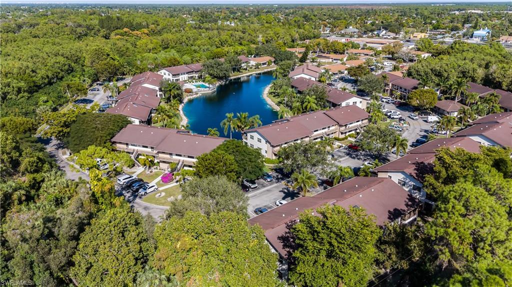 5238 Treetops Drive, Unit L201 Naples, FL 34113 - Photo 32 of 33 an aerial view of house with yard