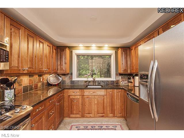 31853 Cedar Road Cleveland, OH 44124 - Photo 8 of 25 Fabulous Kitchen w/granite countertops, loads of cabinetry and storage