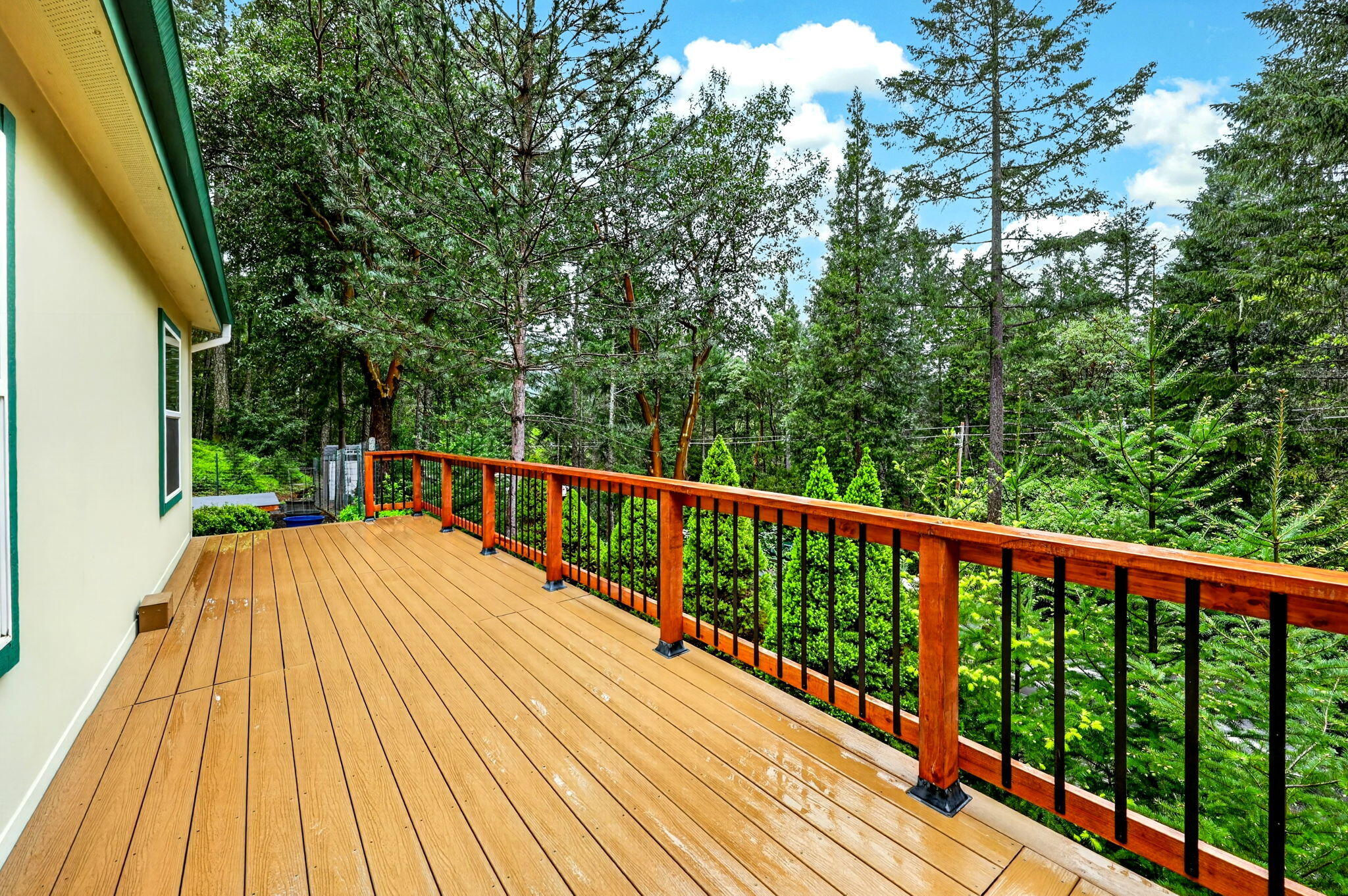 5445 Thompson Creek Road Selma, OR 97538 - Photo 40 of 57 a view of balcony with wooden floor and fence