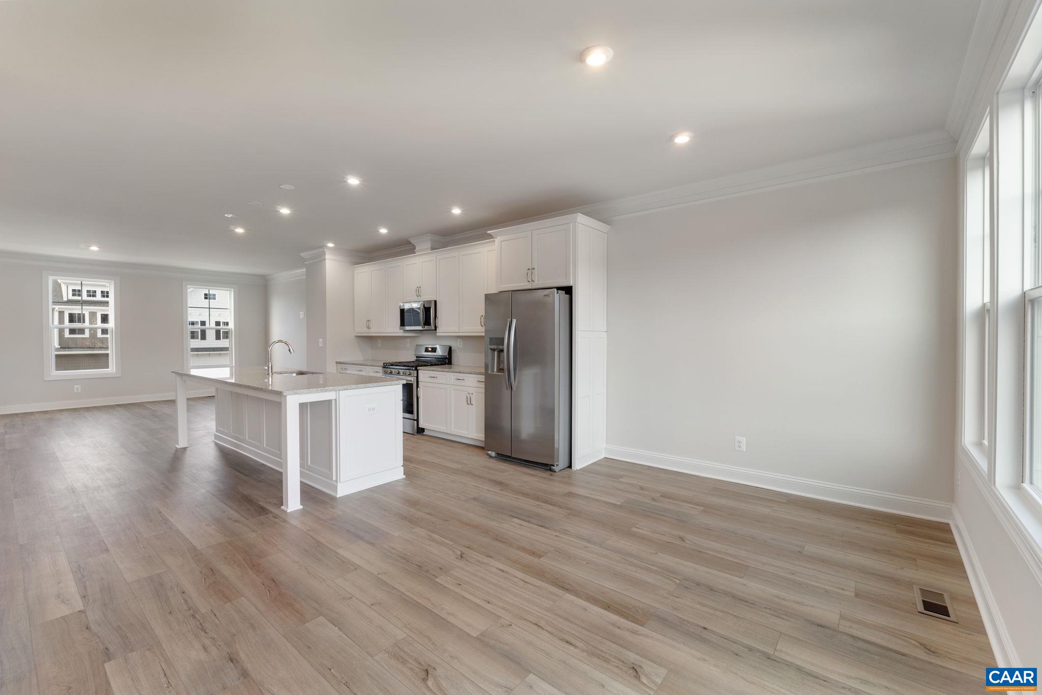 25 Talen Lane Charlottesville, VA 22911 - Photo 11 of 37 a view of kitchen with wooden floor and window
