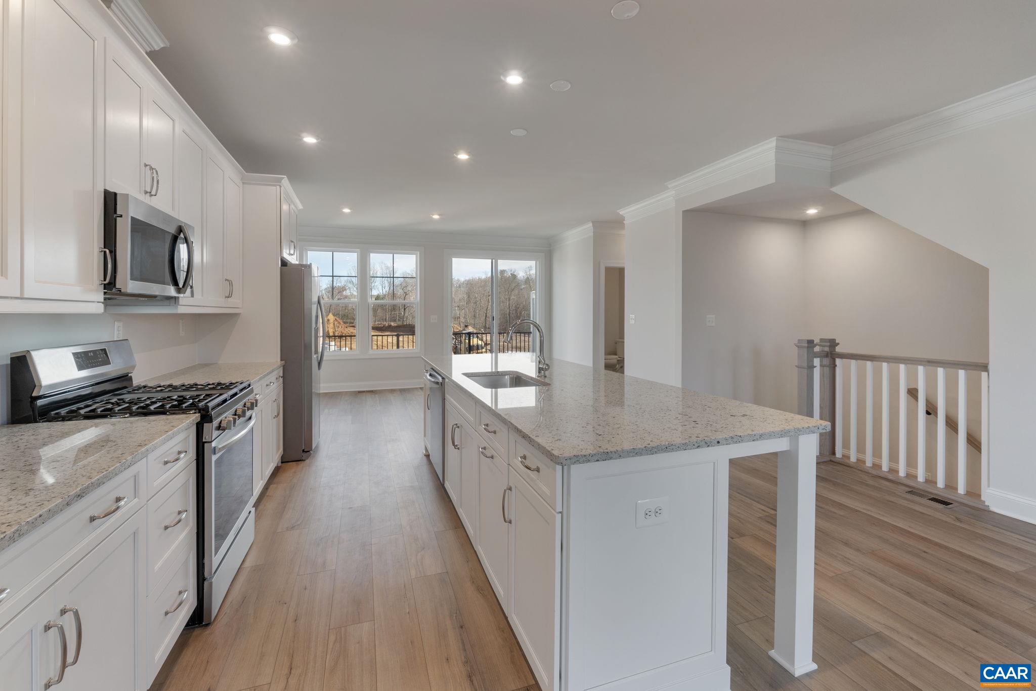 25 Talen Lane Charlottesville, VA 22911 - Photo 17 of 37 a large kitchen with stainless steel appliances granite countertop a lot of counter space and wooden floor