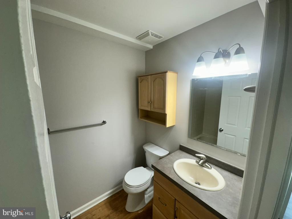 1430 Washington Place Chesterbrook, PA 19087 - Photo 28 of 44 a bathroom with a granite countertop sink toilet and mirror
