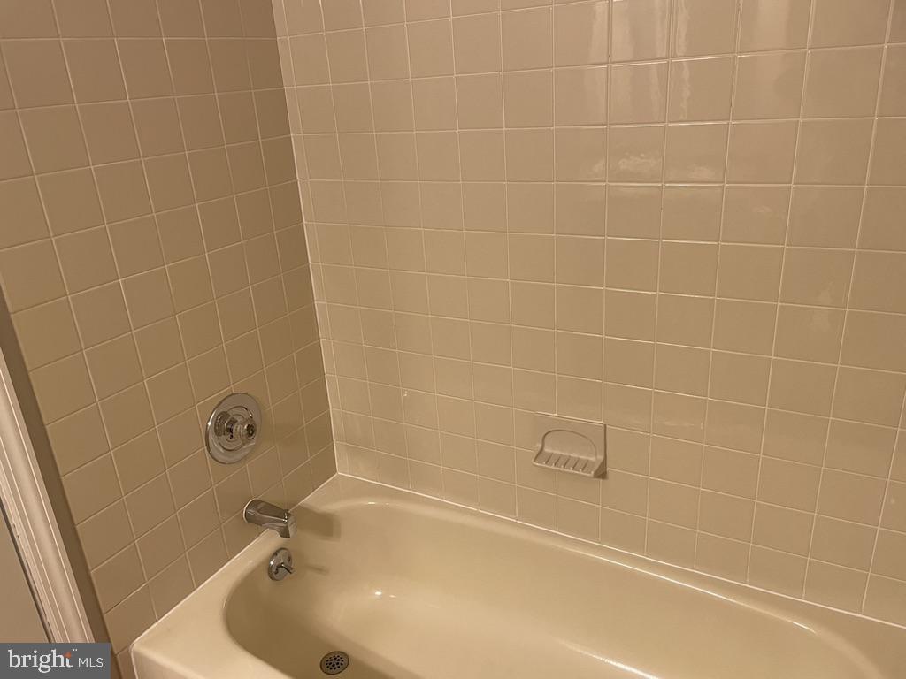 1430 Washington Place Chesterbrook, PA 19087 - Photo 29 of 44 a bath tub sitting next to a white sink