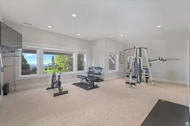 3222 Eagle View Circle Sandy, UT 84092 - Photo 39 of 60 Workout area featuring light colored carpet and recessed lighting