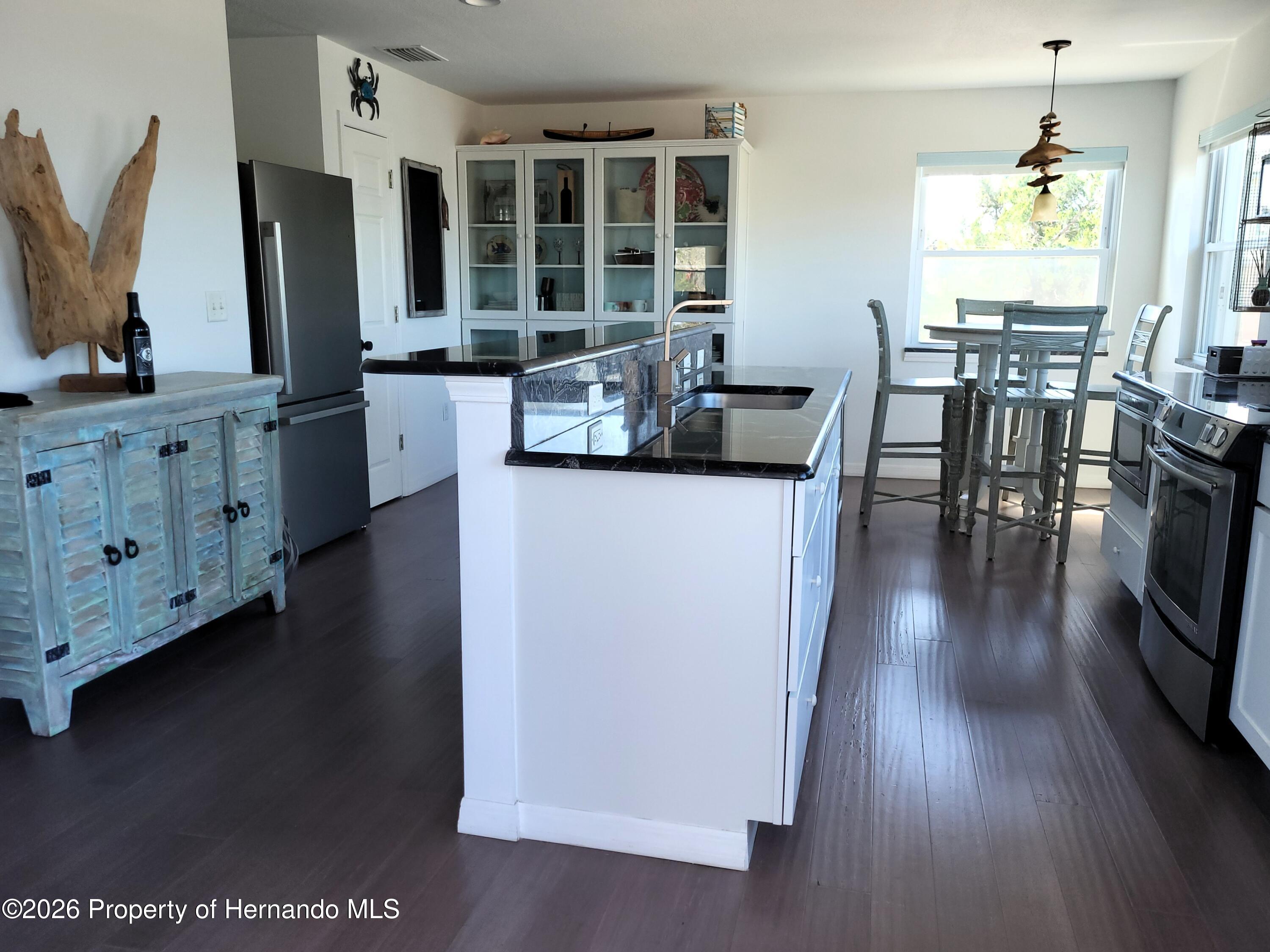 3461 Pandora Drive Weeki Wachee, FL 34607 - Photo 13 of 61 Updated Kitchen with Granite Counter Tops