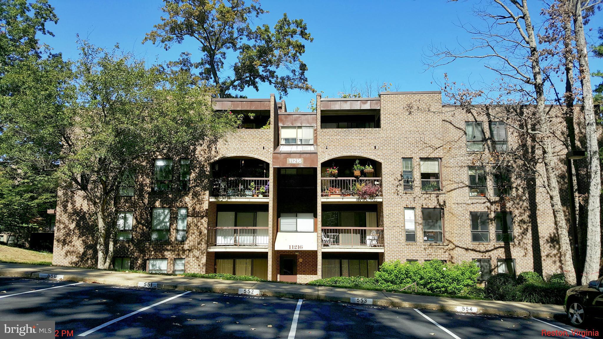11216 Chestnut Grove Square, Unit 117 Reston, VA 20190 - Photo 1 of 22 Exterior (Front)