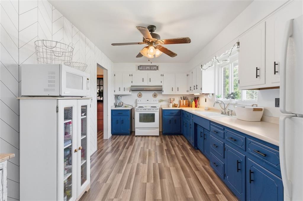 2354 Ritchie Street Aliquippa, PA 15001 - Photo 13 of 43 a kitchen with cabinets a sink and appliances