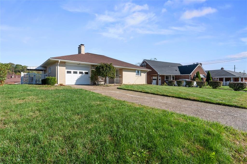2354 Ritchie Street Aliquippa, PA 15001 - Photo 2 of 43 a front view of a house with a yard
