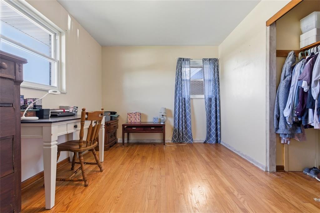 2354 Ritchie Street Aliquippa, PA 15001 - Photo 21 of 43 a view of a workspace with furniture and wooden floor