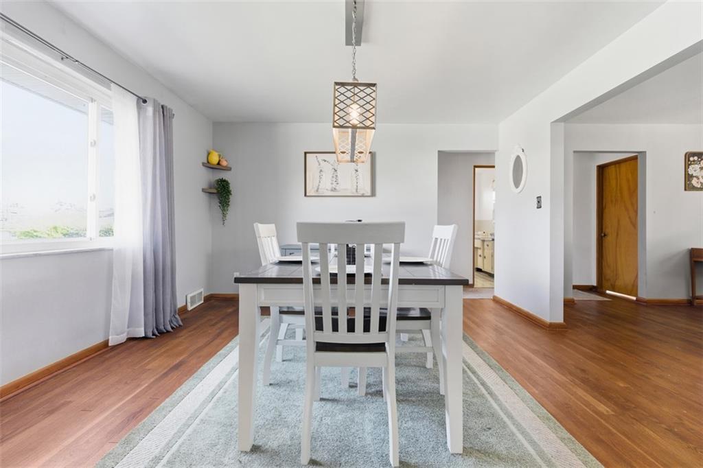 2354 Ritchie Street Aliquippa, PA 15001 - Photo 10 of 43 a view of a dining room with furniture and wooden floor