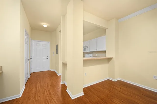 a kitchen with a sink stove and refrigerator