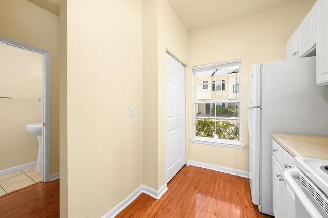a bathroom with a sink a mirror and shower