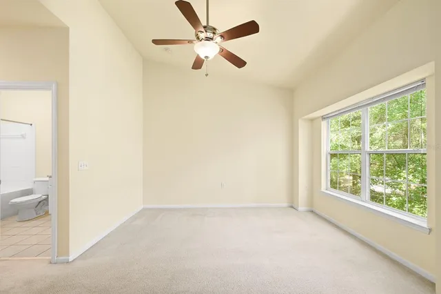 a view of a small space with a fan