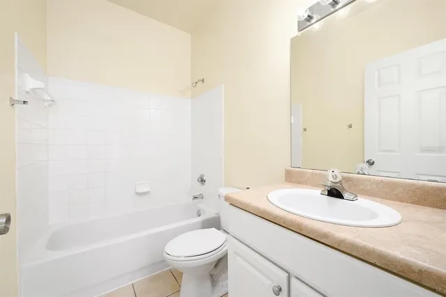 a view of a bathroom with a glass door