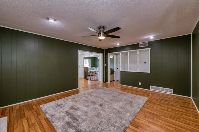 a view of a livingroom with a flat screen tv