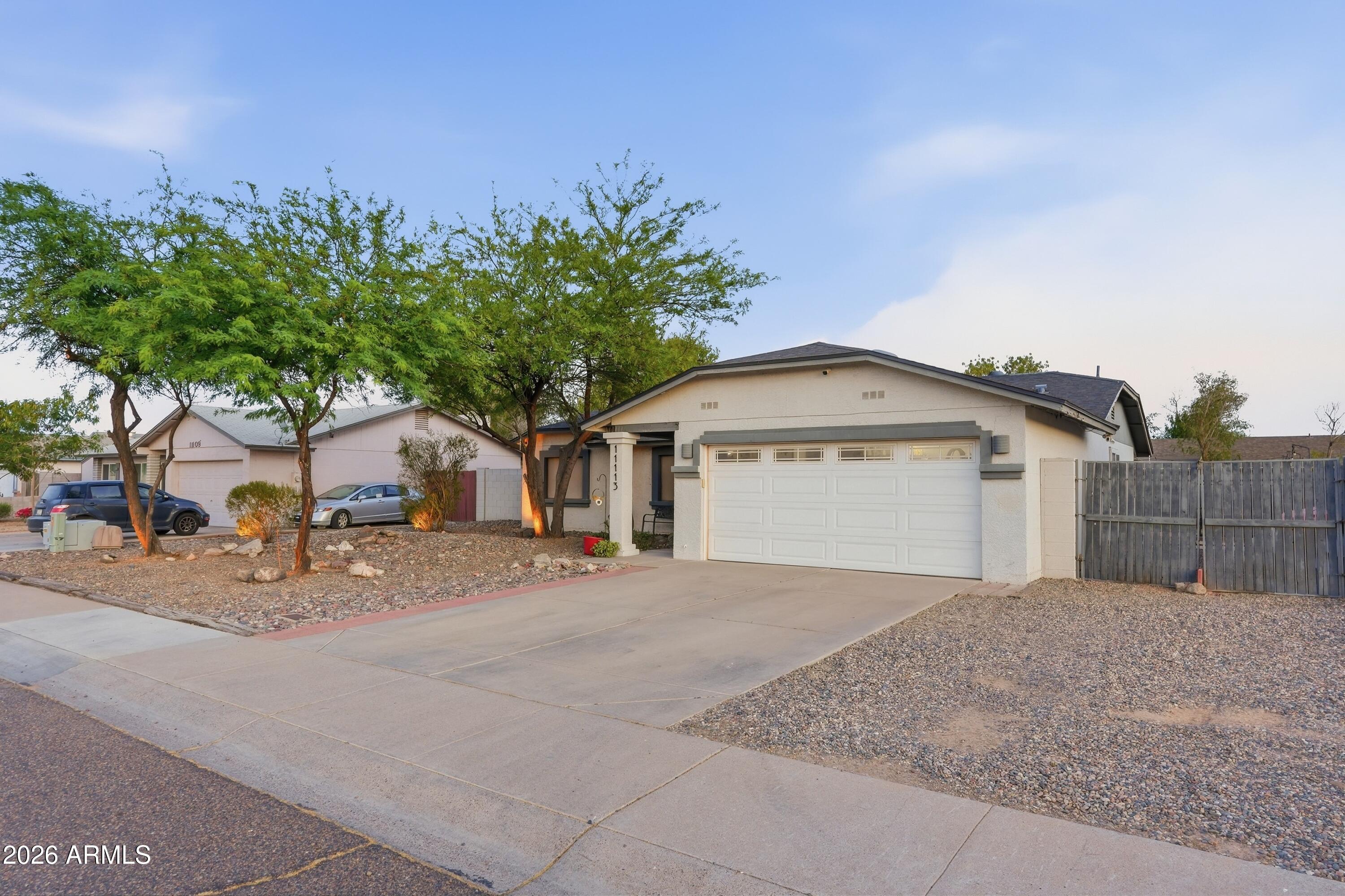 11113 West Roma Avenue Phoenix, AZ 85037 - Photo 4 of 65 004_ListerPros