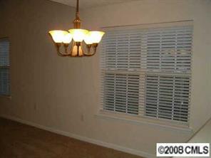 445 Robin Reed Court Pineville, NC 28134 - Photo 5 of 8 a bathroom with a window