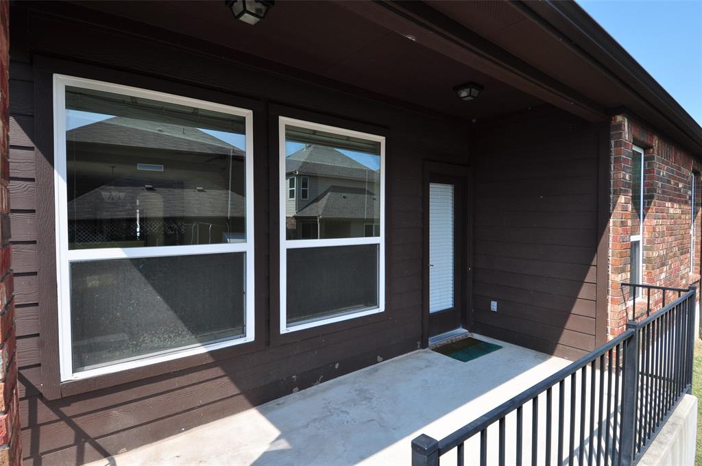 3451 Mayfield Ranch Boulevard, Unit 610 Round Rock, TX 78681 - Photo 17 of 19 View of exterior entry with brick siding