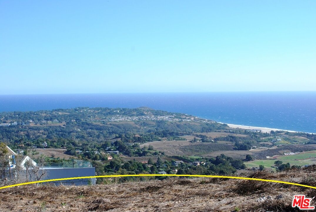 30000 Zenith Point Road Malibu, CA 90265 - Photo 2 of 15 a view of a field with an ocean