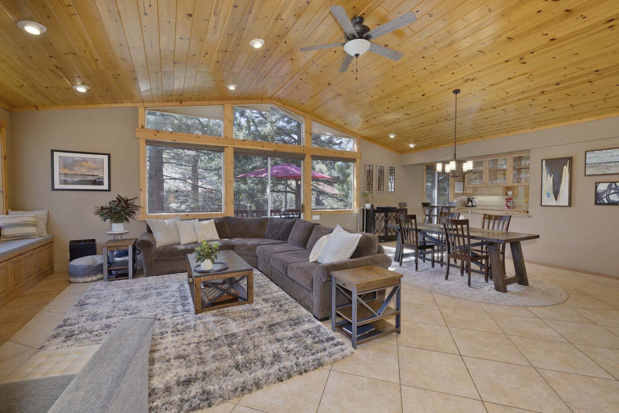 23 Trails End Road Mammoth Lakes, CA 93546 - Photo 2 of 50 a living room with lots of furniture and a large window
