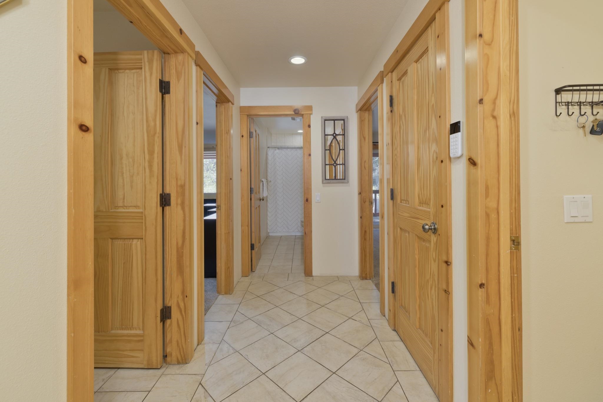 23 Trails End Road Mammoth Lakes, CA 93546 - Photo 21 of 50 a view of a hallway with wooden shelves