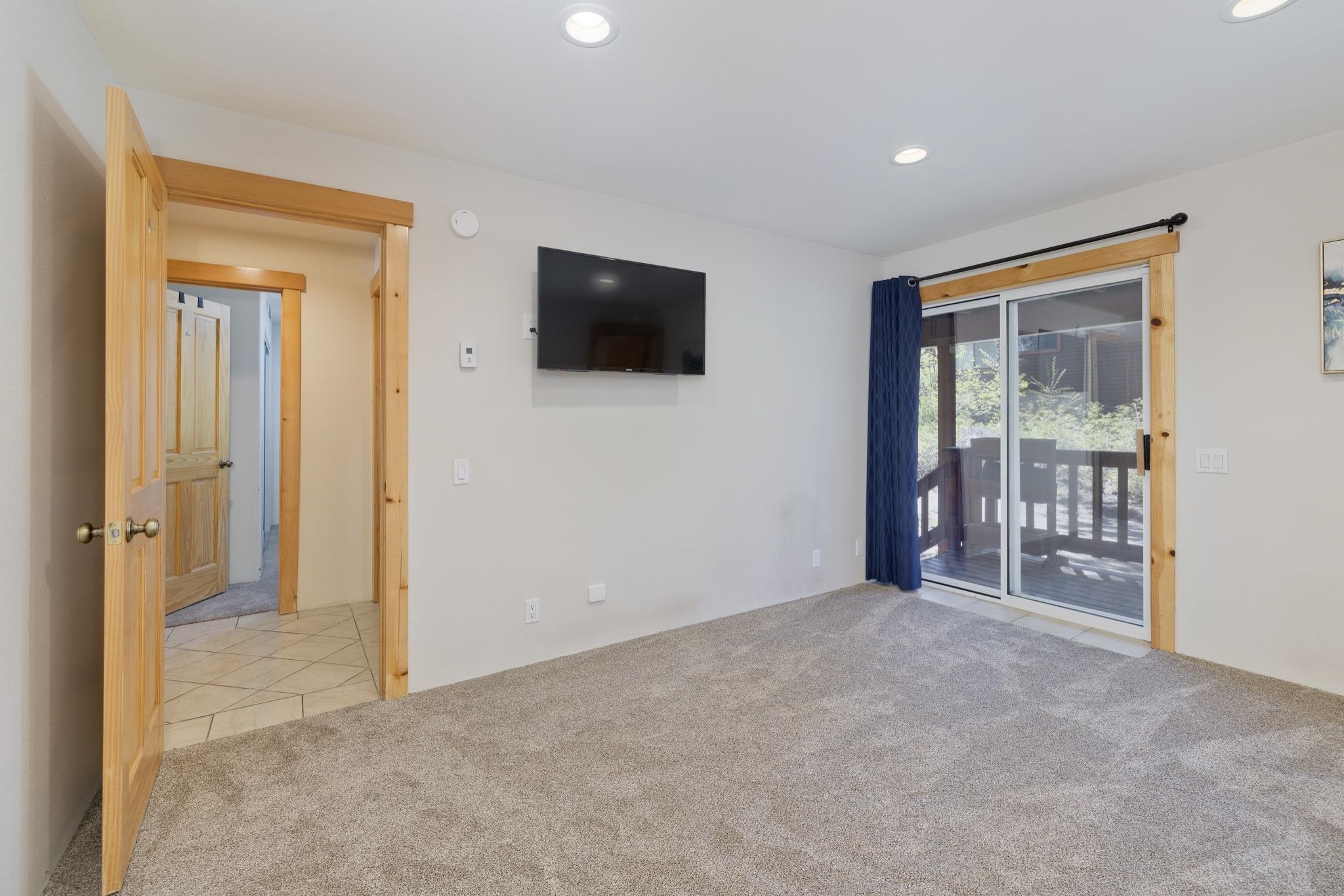 23 Trails End Road Mammoth Lakes, CA 93546 - Photo 27 of 50 a view of an empty room with glass door and a window