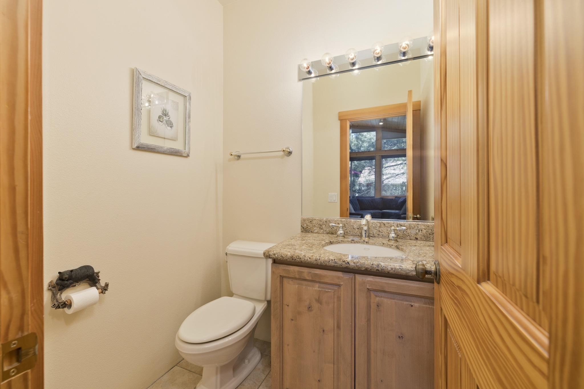 23 Trails End Road Mammoth Lakes, CA 93546 - Photo 31 of 50 a bathroom with a granite countertop sink toilet and mirror