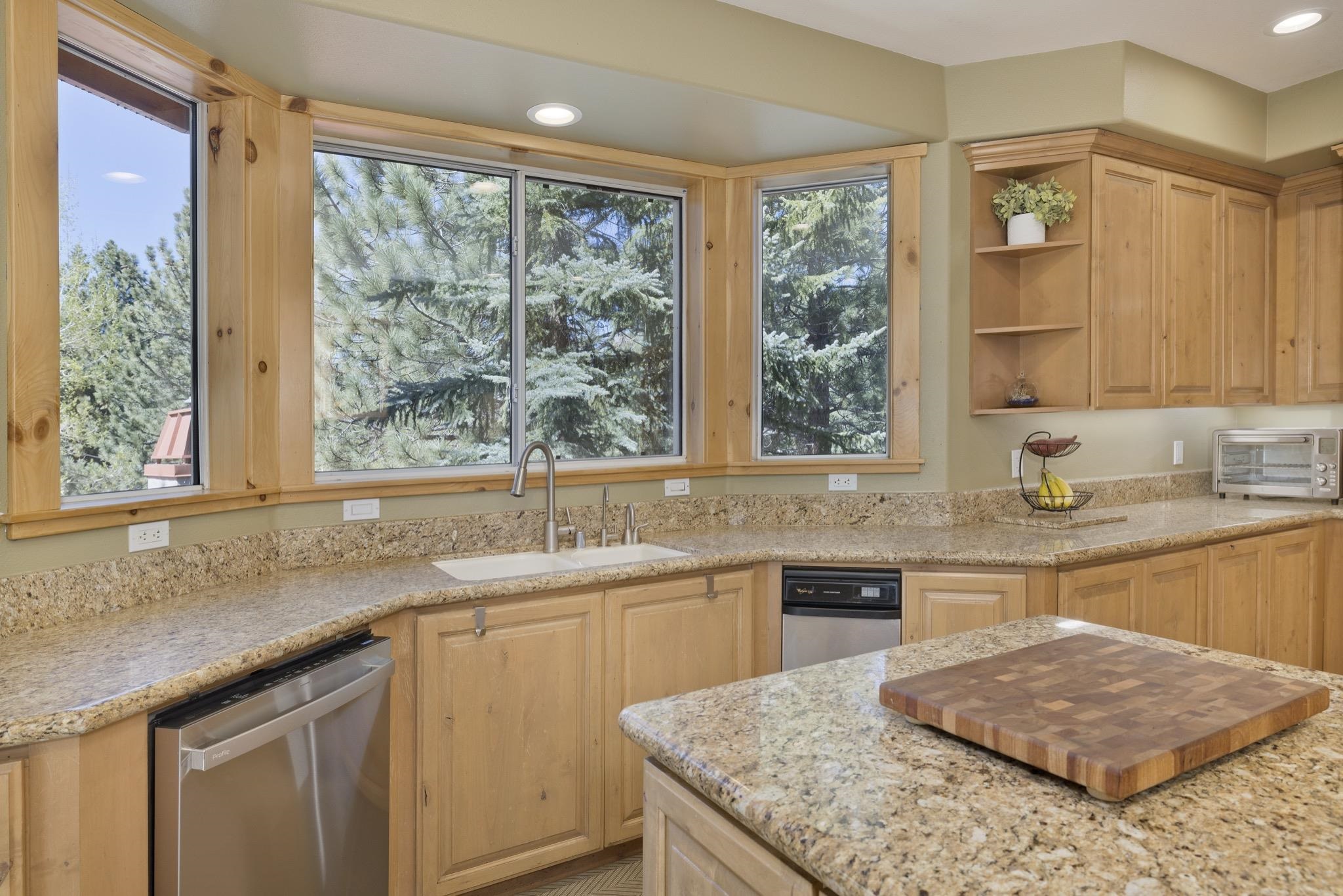 23 Trails End Road Mammoth Lakes, CA 93546 - Photo 33 of 50 a kitchen with a sink stove and cabinets