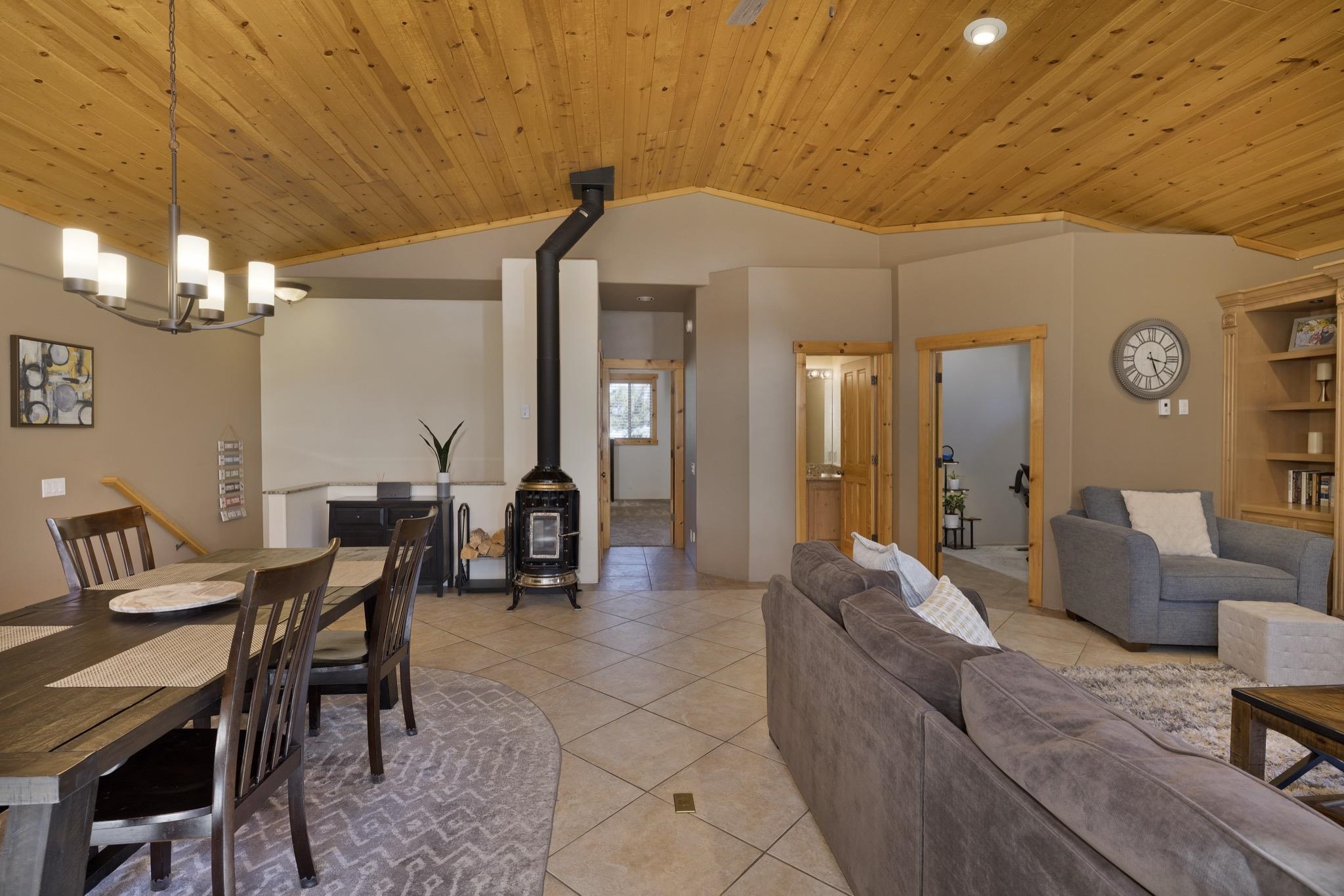 23 Trails End Road Mammoth Lakes, CA 93546 - Photo 43 of 50 a living room with furniture and a chandelier