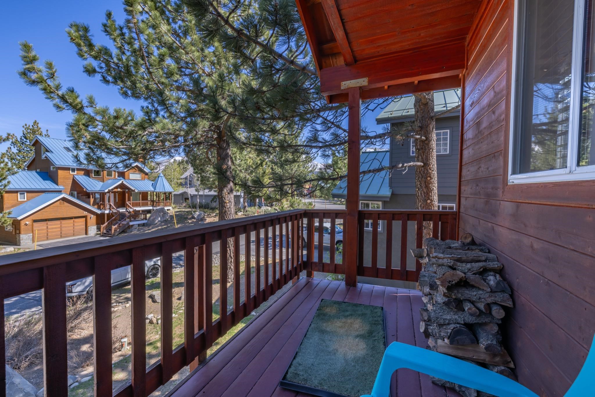 23 Trails End Road Mammoth Lakes, CA 93546 - Photo 47 of 50 a view of a balcony with chairs and wooden fence