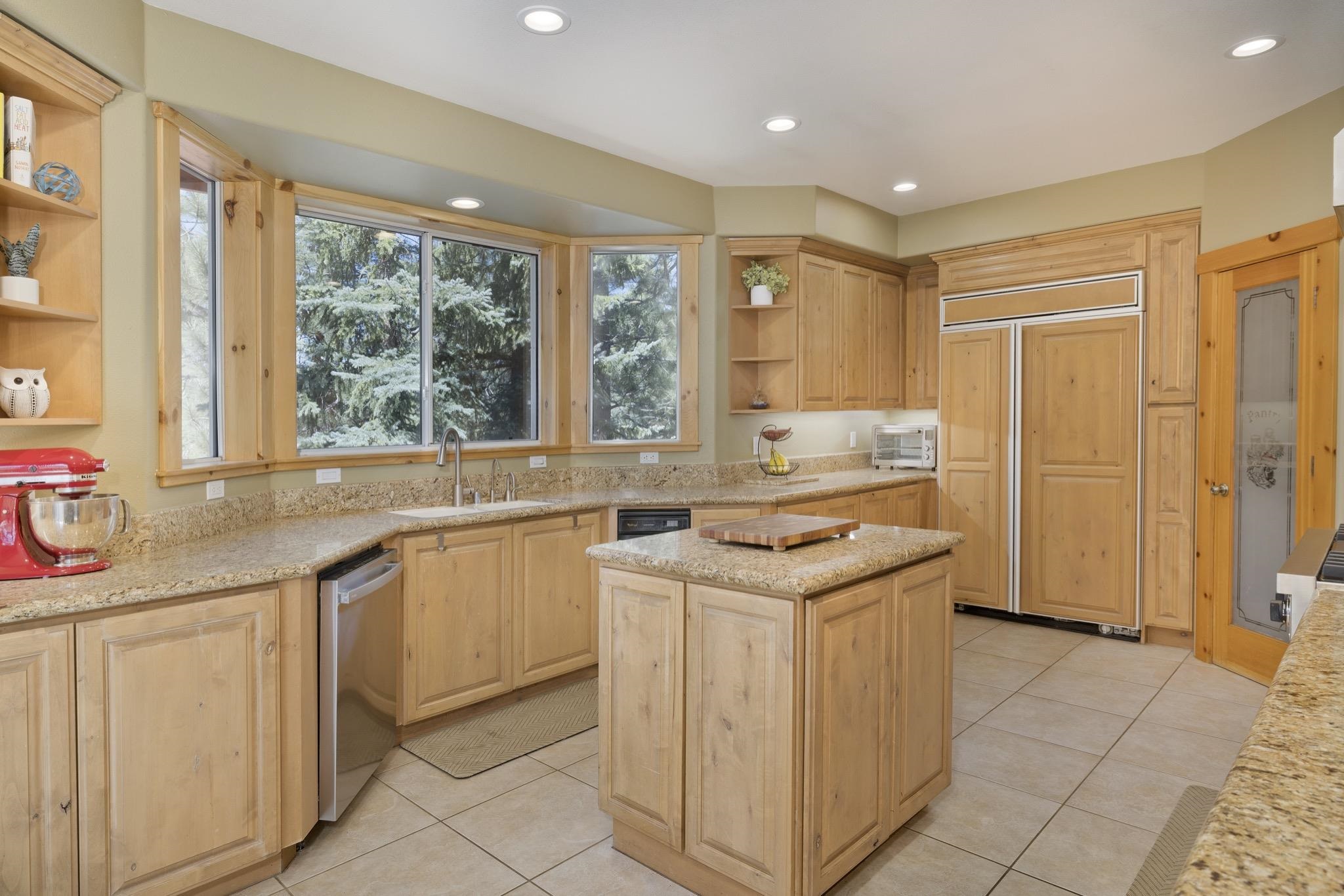 23 Trails End Road Mammoth Lakes, CA 93546 - Photo 5 of 50 a kitchen with a sink stove and cabinets
