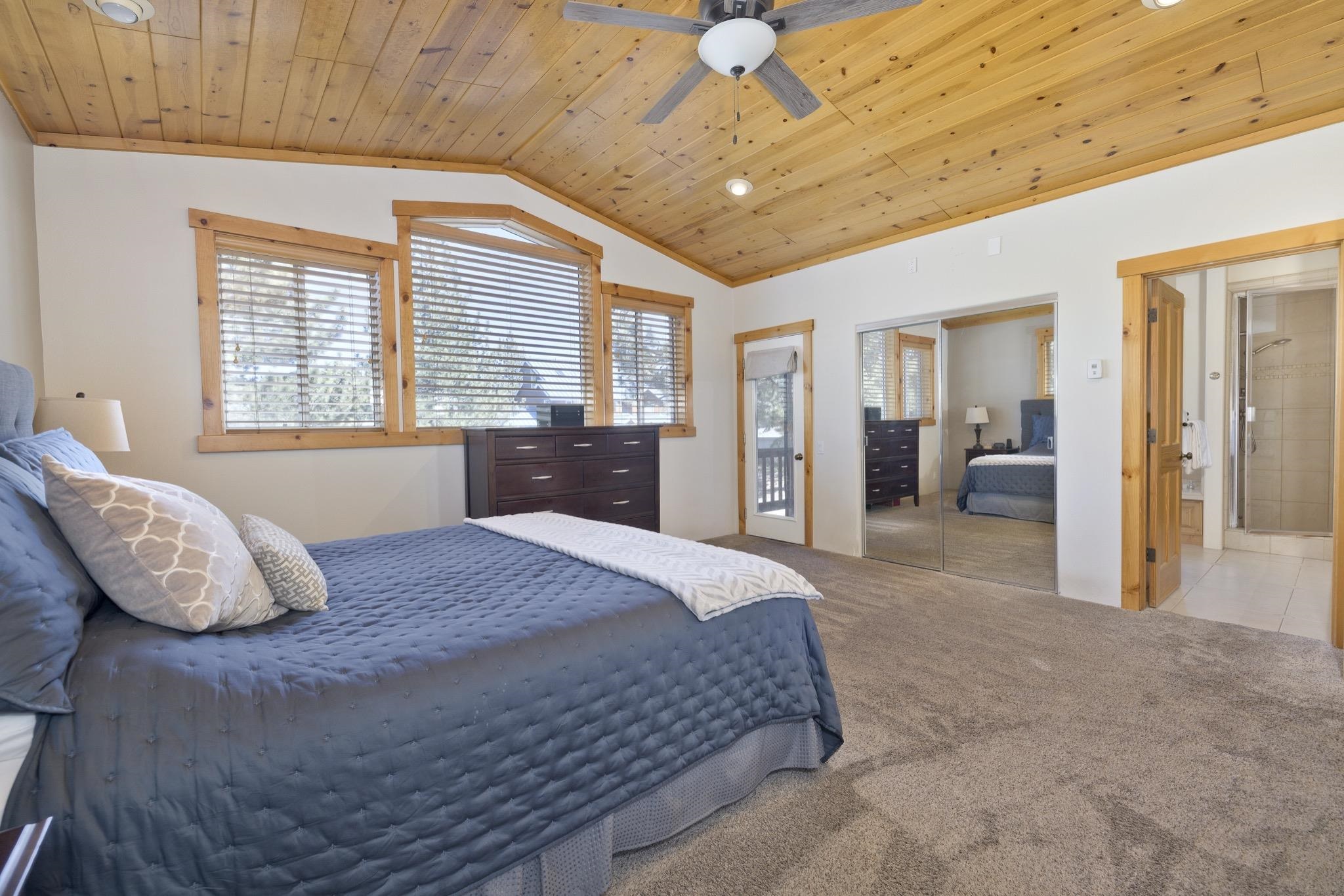 23 Trails End Road Mammoth Lakes, CA 93546 - Photo 8 of 50 a bedroom with a bed and wooden floor