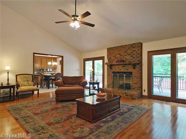3004 Havasu Way High Point, NC 27265 - Photo 2 of 16 Den/Family/Great Room. Large Open Great Room with Patio doors to let in the natural light that bounces off the beautiful hardwood floors. Fresh neutral paint throughout this home and updated Hampton Bay lighting. Gas Log Fireplace to enhance the room.