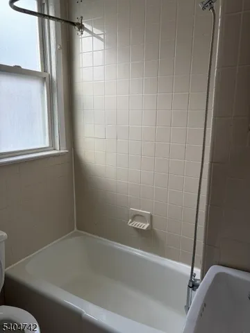 a bathroom with a bathtub