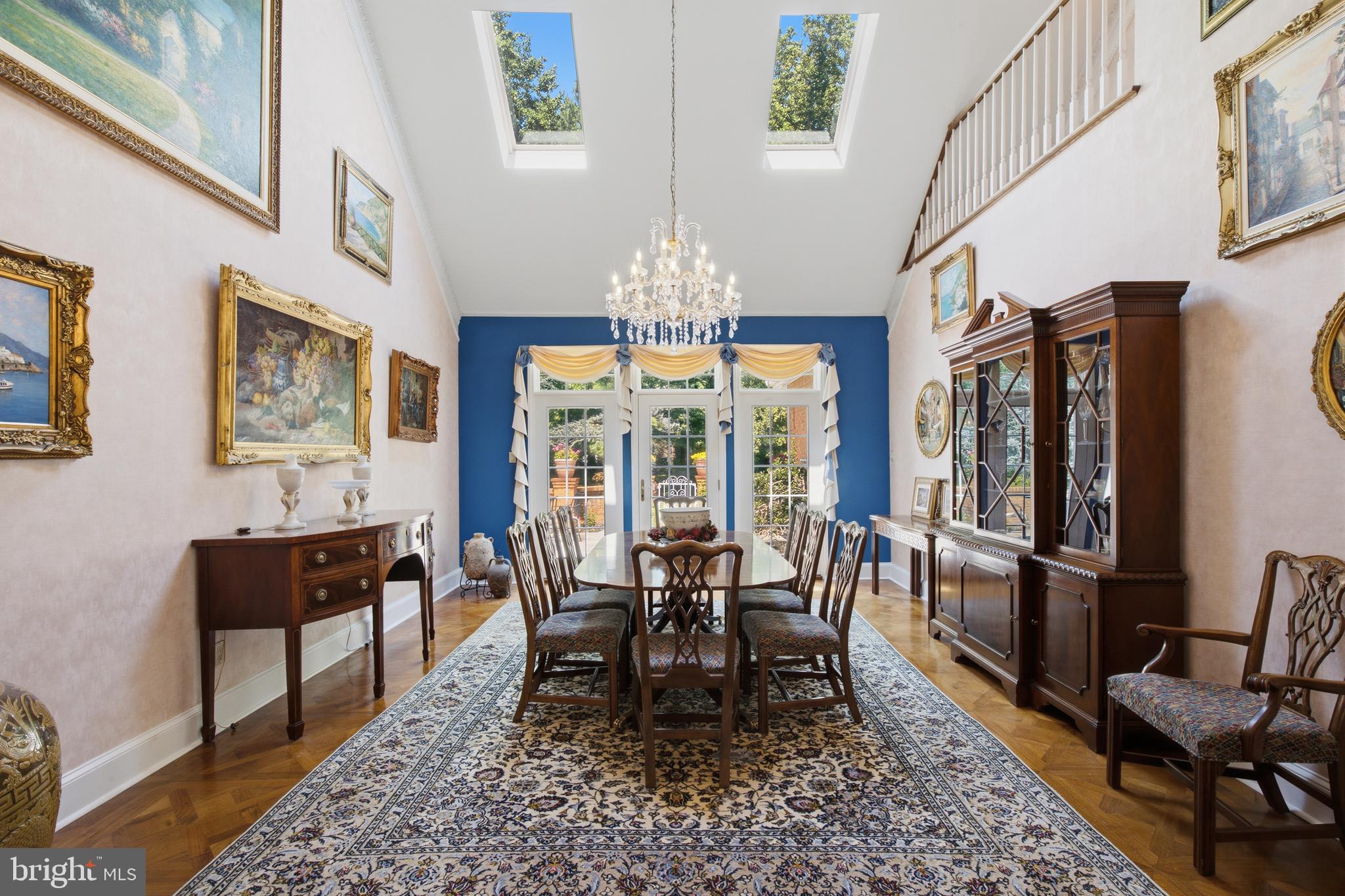 1733 Stocton Road Jenkintown, PA 19046 - Photo 31 of 149 a view of a dining room with furniture a chandelier and wooden floor