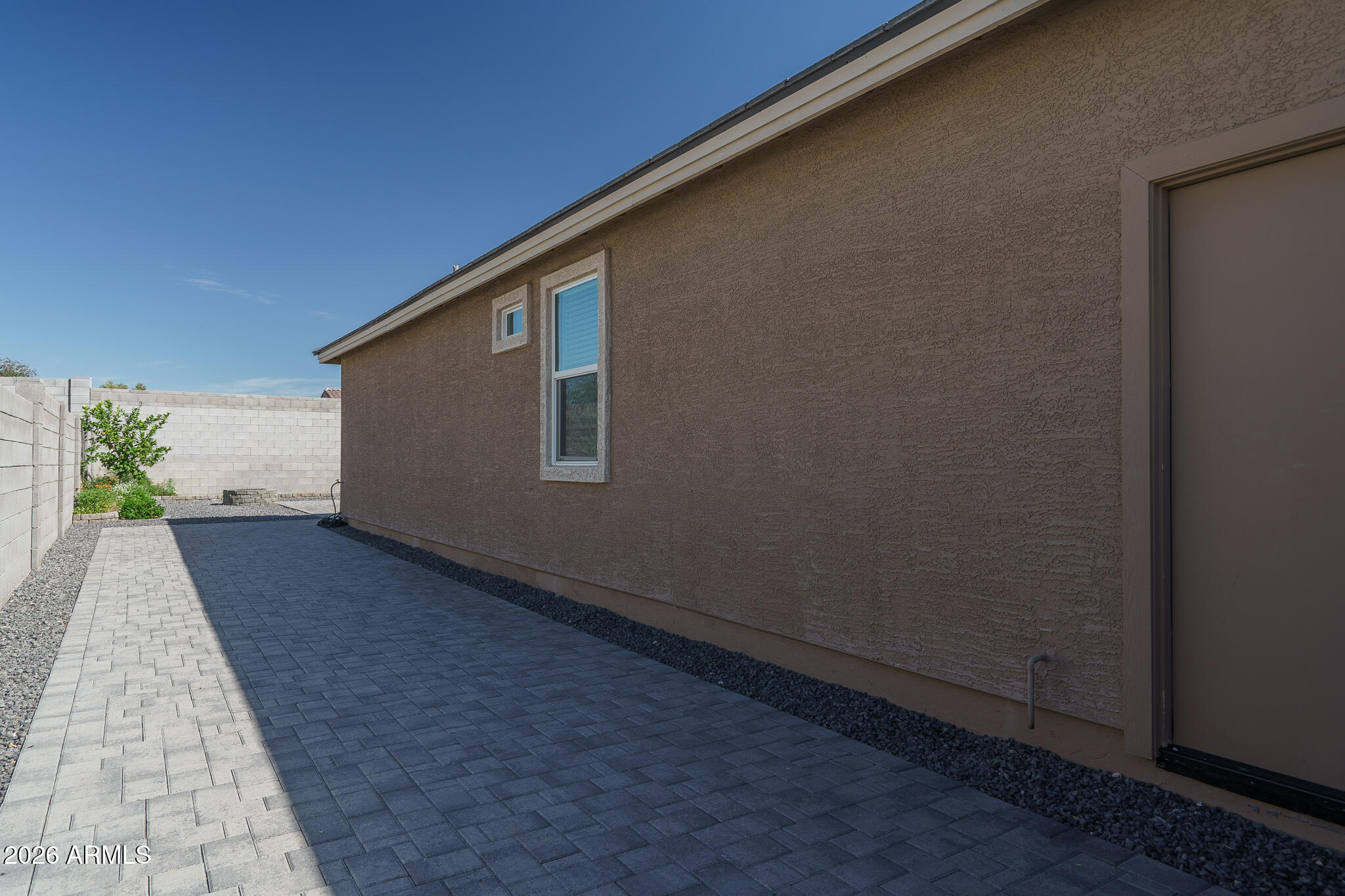 17768 West Raymond Street Goodyear, AZ 85338 - Photo 34 of 38 28) SIDE OF HOME